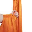 Orange hammock in hand