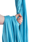 Turquoise hammock in hand