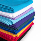 All different colour variant stretching silks folded and stacked up