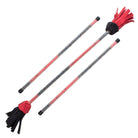 red and black picasso flower stick with hand sticks laid next to it