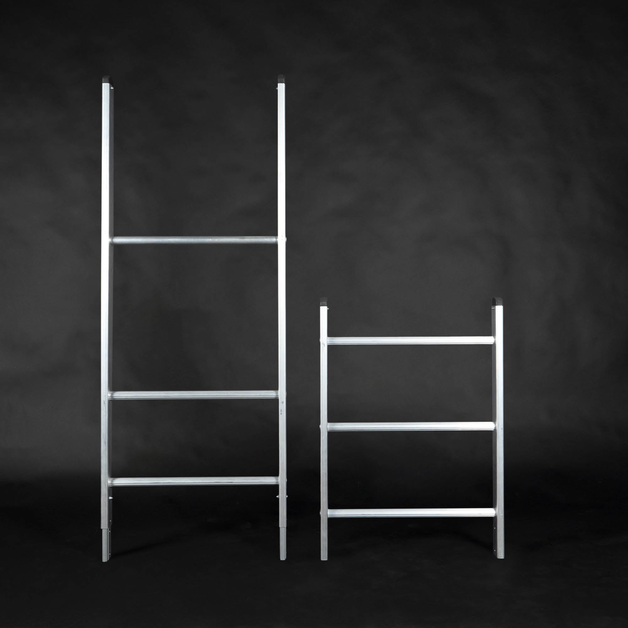 Ladder unassembled both pieces standing 