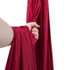 Maroon hammock in hand
