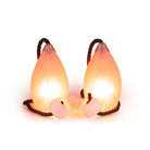 Flowtoys Podpoi V2 glowing in a light background