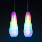 Flowtoys vision spin poi glowing with white background whilst hanging